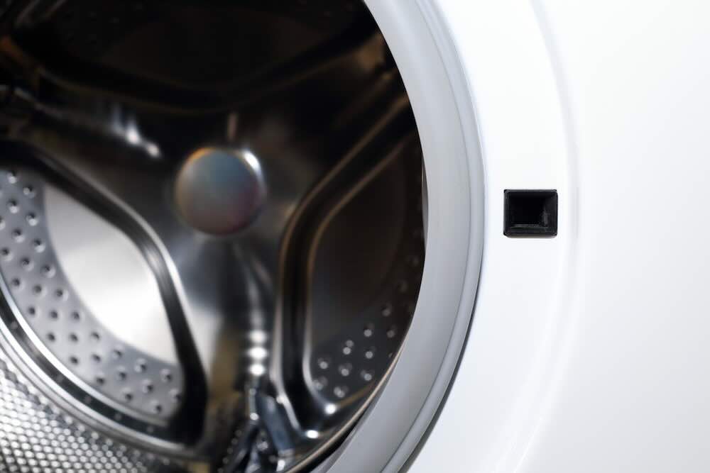 Weiße waschmaschine für hausarbeit kleidung reinigungs
